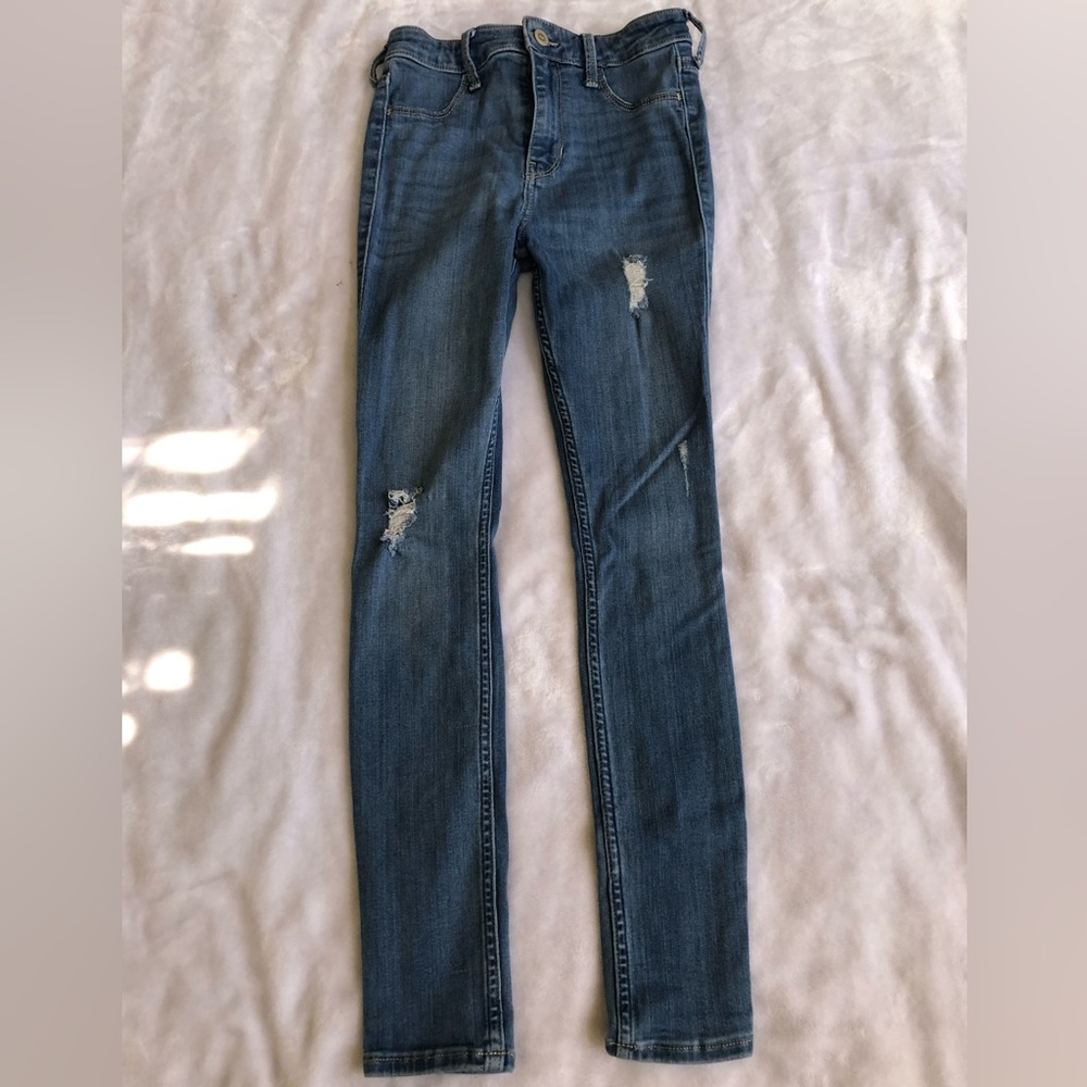 High waisted med-washed ripped jean leggings